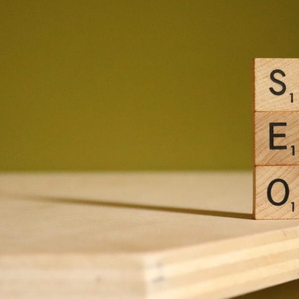 a scrabbled wooden block with the word stem on it